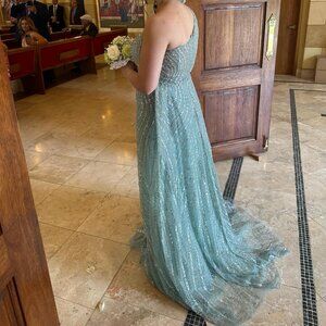 Sage green gown with overskirt